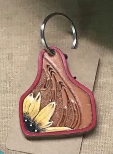 Hand painted leather keychains and earrings